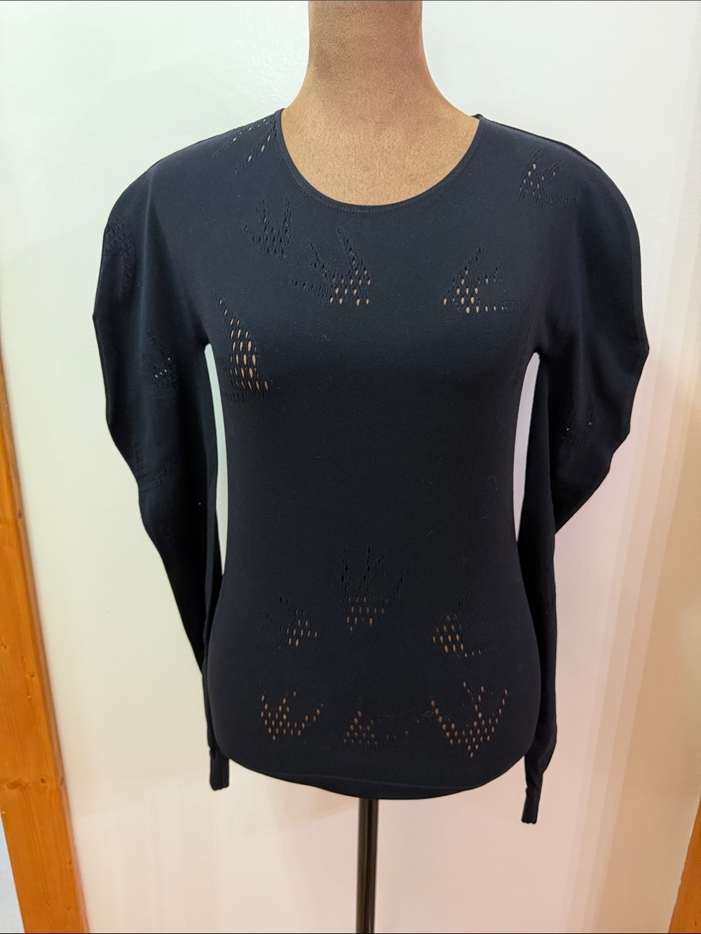 Alexander McQueen. Long Sleeve Top with Laser Cut. NWOT. Size Medium. Stretch